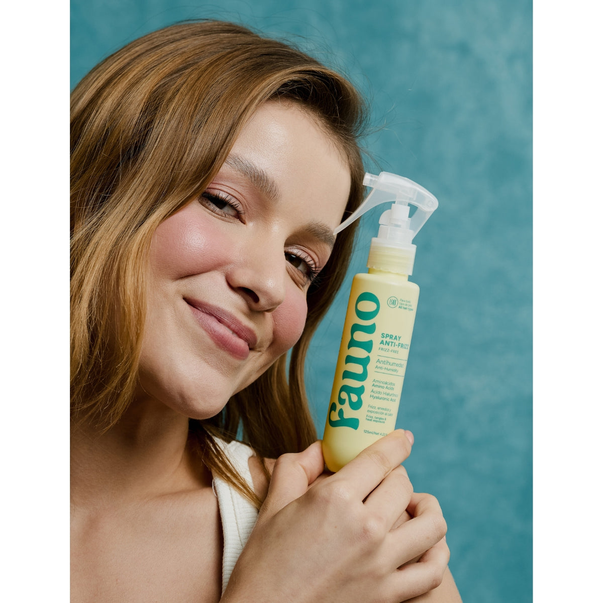 Spray que controla el frizz en el cabello y bloquea la humedad